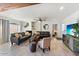 Inviting living room featuring modern decor, a fireplace, and comfortable seating at 8209 E Heatherbrae Ave, Scottsdale, AZ 85251