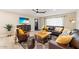 Comfortable living room with a large sofa, a stylish rug, and modern decor, creating a welcoming space at 8213 E Fairmount Ave, Scottsdale, AZ 85251