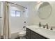 Updated bathroom with subway tile shower, modern vanity, and stylish black-and-white floor tile at 8227 N 15Th Pl, Phoenix, AZ 85020