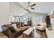 Open-concept living area featuring hardwood floors, large windows, and vaulted ceilings providing abundant natural light at 8227 N 15Th Pl, Phoenix, AZ 85020