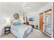 This bedroom features an outdoor entrance and a flat screen TV on the wall at 9630 E Preserve Way, Scottsdale, AZ 85262