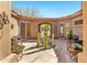 Beautiful courtyard featuring desert landscaping, seating, and covered patio access at 9630 E Preserve Way, Scottsdale, AZ 85262