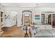 Bright living room with hardwood floors and decorative art at 9630 E Preserve Way, Scottsdale, AZ 85262