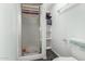 A cozy bathroom with a shower, toilet, and built-in shelving for storage at 9736 E Main St # 43, Mesa, AZ 85207