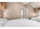 A calming bedroom with a neutral palette, featuring a closet and a comfortable bed at 9736 E Main St # 43, Mesa, AZ 85207