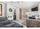 Inviting bedroom with a day bed, closet, and access to the outdoors at 9736 E Main St # 43, Mesa, AZ 85207