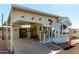 Cute home featuring covered parking, desert-themed decor, and a quaint front sitting area at 9736 E Main St # 43, Mesa, AZ 85207