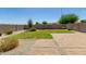 A lush backyard featuring pavers and gravel landscaping at 1021 W Vineyard Plains Dr, San Tan Valley, AZ 85143