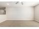 An open bonus room with neutral colored carpet and recessed lighting at 1021 W Vineyard Plains Dr, San Tan Valley, AZ 85143