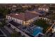 Aerial view showcases the outdoor living spaces of this home, featuring a pool, backyard, and patios at 10511 E Diffraction Ave, Mesa, AZ 85212