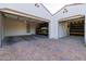 Spacious three car garage with extra storage bins and newly paved driveway at 10511 E Diffraction Ave, Mesa, AZ 85212