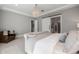 Comfortable main bedroom offering generous space, natural light, and an ensuite bathroom at 10511 E Diffraction Ave, Mesa, AZ 85212