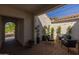 Comfortable and stylish patio with charming string lights and well-manicured landscaping at 10511 E Diffraction Ave, Mesa, AZ 85212