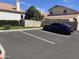 Reserved parking spot in a well-maintained parking lot with nice landscaping at 1053 E Sunburst Ln, Tempe, AZ 85284