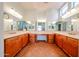 Large bathroom with double vanity sinks, tile floor, and ample counter space for a luxurious feel at 12439 W Yellow Bird Ln, Peoria, AZ 85383