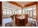 Open concept home, from the dining room with seating for six, to the open and bright living room with shutters at 12439 W Yellow Bird Ln, Peoria, AZ 85383