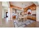 Open dining room with a view of the kitchen at 12439 W Yellow Bird Ln, Peoria, AZ 85383