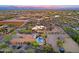 A beautiful desert community showcases an equestrian facility, stunning homes and picturesque landscapes at 13627 E Monument Dr, Scottsdale, AZ 85262