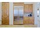 Kitchen detail showing the stainless steel refrigerator and matching cabinetry at 13627 E Monument Dr, Scottsdale, AZ 85262