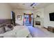 Cozy main bedroom features a fireplace, access to the backyard, and elegant decor, creating a peaceful retreat at 13627 E Monument Dr, Scottsdale, AZ 85262