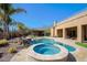 Enjoy a luxurious spa, pool and desert landscaped backyard in a private setting at 13627 E Monument Dr, Scottsdale, AZ 85262