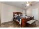 Spacious bedroom with vaulted ceiling, ceiling fan, and large bed at 1428 W Mesquite Ave, Apache Junction, AZ 85120