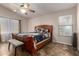 Cozy bedroom with tile flooring and natural light at 1428 W Mesquite Ave, Apache Junction, AZ 85120
