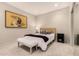 A well decorated bedroom with carpet, modern art, and a sliding door closet at 15050 N Thompson Peak Pkwy # 1035, Scottsdale, AZ 85260