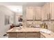 A view from the kitchen looking into the dining area at 15050 N Thompson Peak Pkwy # 1035, Scottsdale, AZ 85260