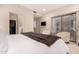 Bright main bedroom with plush carpet and access to outdoor light at 15050 N Thompson Peak Pkwy # 1035, Scottsdale, AZ 85260