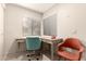 Bright office nook with natural light, a modern desk, and comfortable seating at 15050 N Thompson Peak Pkwy # 1035, Scottsdale, AZ 85260