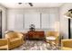 Relaxing sitting area with unique decor, mid-century modern furniture, and plenty of natural light at 15050 N Thompson Peak Pkwy # 1035, Scottsdale, AZ 85260