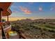 Aerial shot of a covered patio with beautiful sunset views and a pool overlooking the desert landscape at 15106 E Miravista --, Fountain Hills, AZ 85268