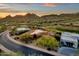 Beautiful aerial view of a luxury home nestled among a golf course, offering scenic mountain views at 15106 E Miravista --, Fountain Hills, AZ 85268