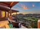 Covered balcony with seating offers panoramic views of the surrounding golf course and mountains at 15106 E Miravista --, Fountain Hills, AZ 85268