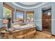 Elegant bathroom suite featuring a soaking tub, walk-in shower, and large windows with views at 15106 E Miravista --, Fountain Hills, AZ 85268