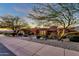 Exterior of a southwest-style home showcasing desert landscaping and architectural details at 15106 E Miravista --, Fountain Hills, AZ 85268