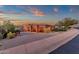 Beautiful view of a large three car garage with stone accents and brick driveway at 15106 E Miravista --, Fountain Hills, AZ 85268