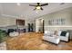 A spacious bonus living area features travertine floors, comfortable seating, a mini-bar, and a home gym at 15106 E Miravista --, Fountain Hills, AZ 85268