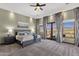 Inviting primary bedroom with a king bed, scenic views, and soft, neutral tones for a relaxing retreat at 15106 E Miravista --, Fountain Hills, AZ 85268