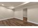 Spacious basement area with recessed lighting and attractive wood-look flooring at 1533 W Culver St, Phoenix, AZ 85007