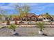 Well-manicured front yard with lush landscaping and a decorative fountain, enhancing curb appeal at 1533 W Culver St, Phoenix, AZ 85007