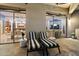 Outdoor balcony featuring stylish lounge chairs with city views at 15802 N 71St St # 754, Scottsdale, AZ 85254