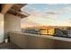 Balcony showcasing sunset and mountain vistas, blending urban and natural beauty at 15802 N 71St St # 754, Scottsdale, AZ 85254