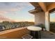 Balcony with a beautiful sunset view overlooking a well-maintained neighborhood at 15802 N 71St St # 754, Scottsdale, AZ 85254