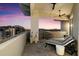 Spacious balcony featuring lounge seating and sunset views at 15802 N 71St St # 754, Scottsdale, AZ 85254