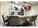 Modern bar area with unique lighting, comfortable seating, and a contemporary design at 15802 N 71St St # 754, Scottsdale, AZ 85254