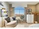 Cozy bedroom showcases a reading nook with natural light and plush seating, perfect for relaxation at 15802 N 71St St # 754, Scottsdale, AZ 85254