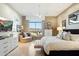 Serene bedroom with a comfortable bed, ample natural light, and scenic mountain views from a large window at 15802 N 71St St # 754, Scottsdale, AZ 85254