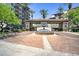 Community entrance with brick pavers, a fountain, and professional landscaping at 15802 N 71St St # 754, Scottsdale, AZ 85254